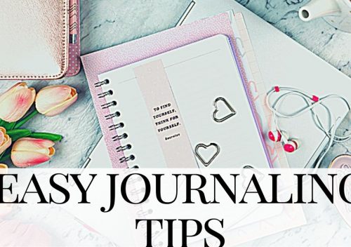 pink journal next to a bunch of flowers - easy journaling