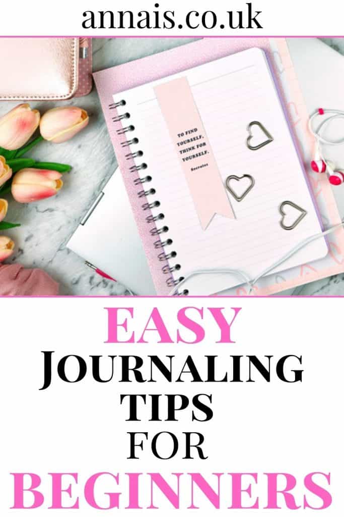 pink journal next to a bunch of flowers - easy journaling