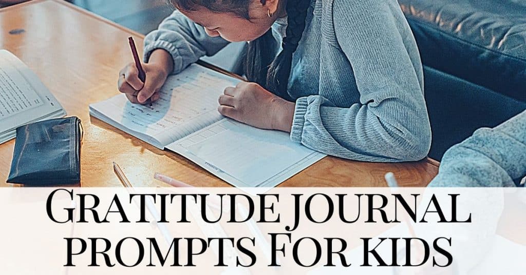 Girl sits at at table writing gratitude journal prompts for kids