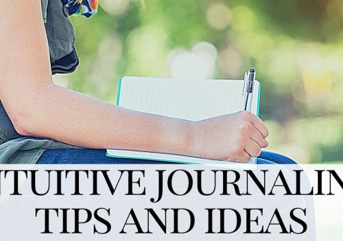 woman sitting wring in a notebook - intuitive journaling