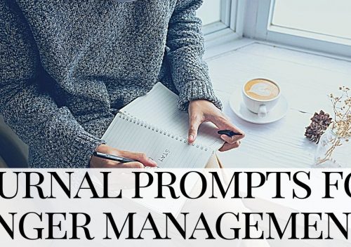 woman sits at a table writing journal prompts for anger