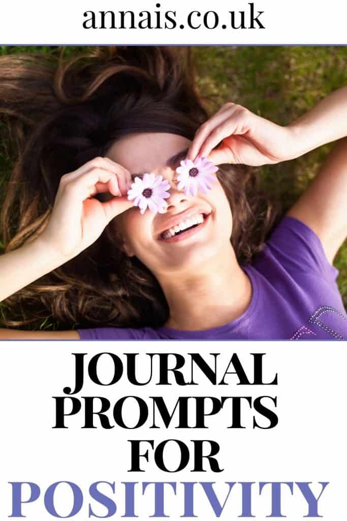 happy woman -positive journal prompts